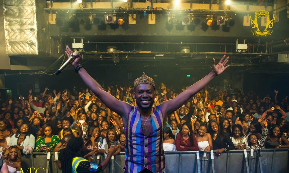 Adekunle Gold age — Nigerian singer performing live