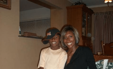 Natosha Baker smiling with family