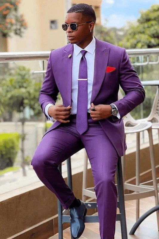 Stylish man wearing a purple suit 