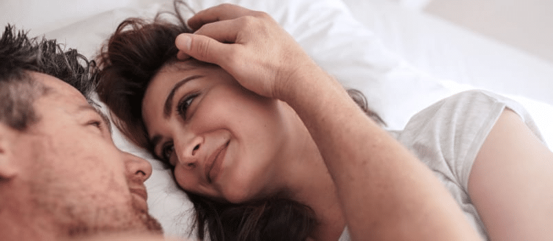 Couple facing emotional tension during sex confession
