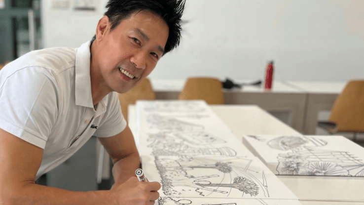 Edmund Chen Singapore actor and artist smiling at event