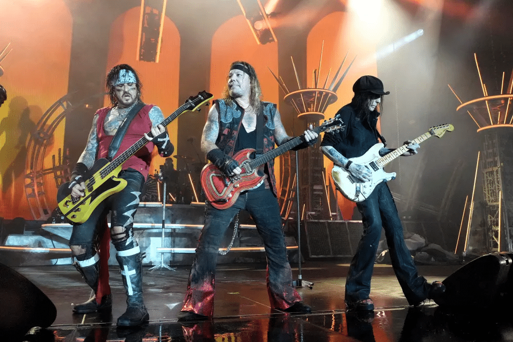 Motley Crue age band members performing live on stage