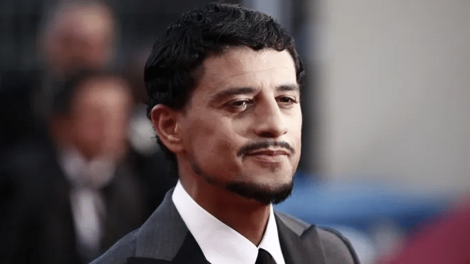 Saïd Taghmaoui at a film festival, glance to the side, focus on face