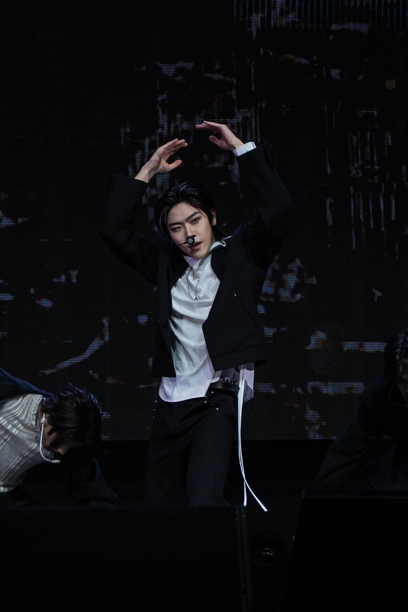 Ariana Grande biography net worth 2026 - performing live on stage