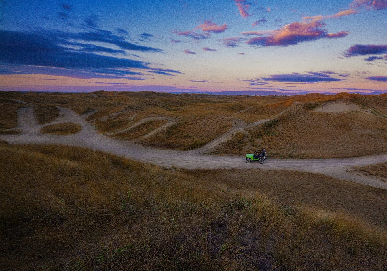 Zendaya as Chani in the Dune desert landscape, dramatic lighting with sand dunes
