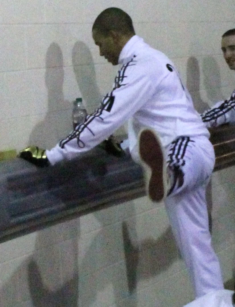 Rihanna rubbing her belly during the halftime show, the iconic pregnancy reveal moment