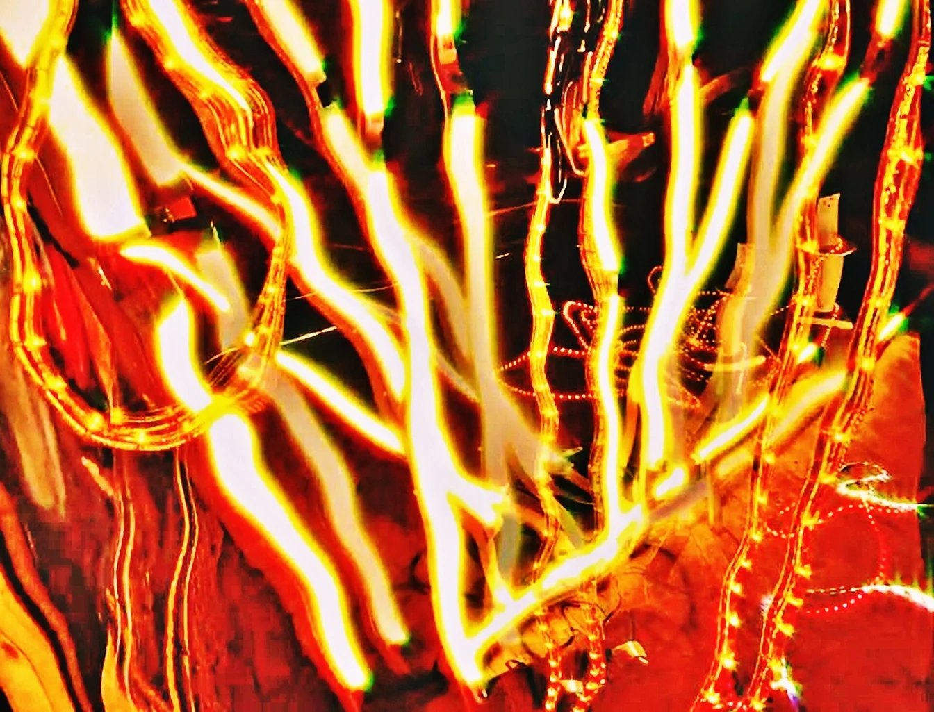 Doja Cat in a futuristic music video set with cosmic visuals and neon lighting, representing the Planet Her aesthetic